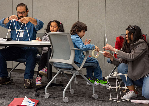 Attendees interacting at Science: Unrestricted