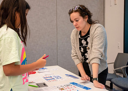 Attendees interacting at Science: Unrestricted