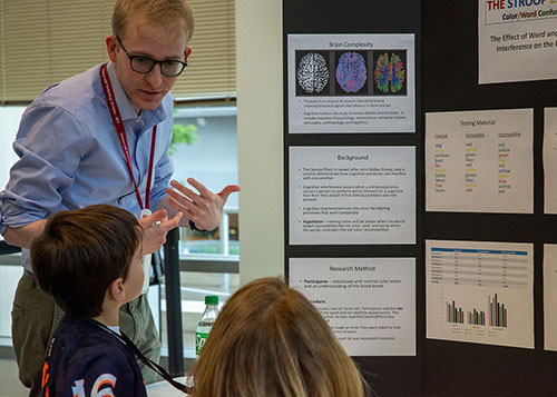 Attendees interacting at Science: Unrestricted