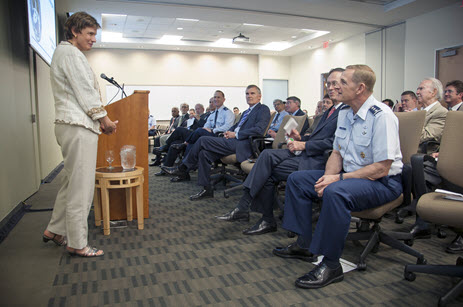 Margaret Myers introduces Lt Gen Michael J. Basla (USAF) to a Cyber Seminar audience